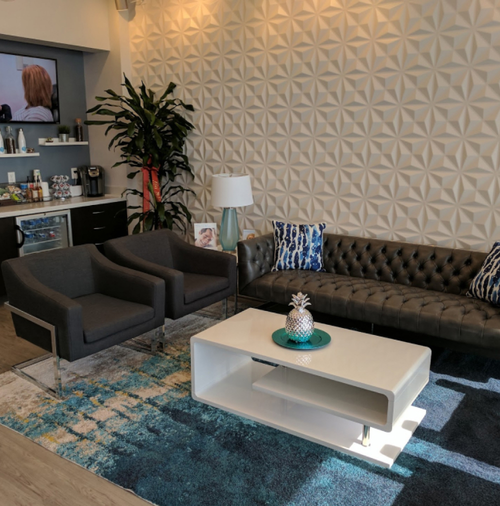Modern waiting area of Smile Avenue family dentist in Cypress, TX, featuring a contemporary design with comfortable seating, stylish decor, and a welcoming atmosphere.