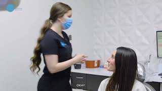 A Patient Consulting With A Dental Professional