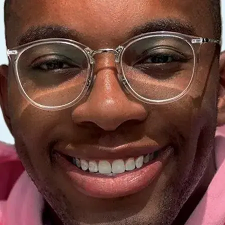 Invisalign Aligners1 16 Young Black Woman With Glasses Smiling And Showing White Teeth