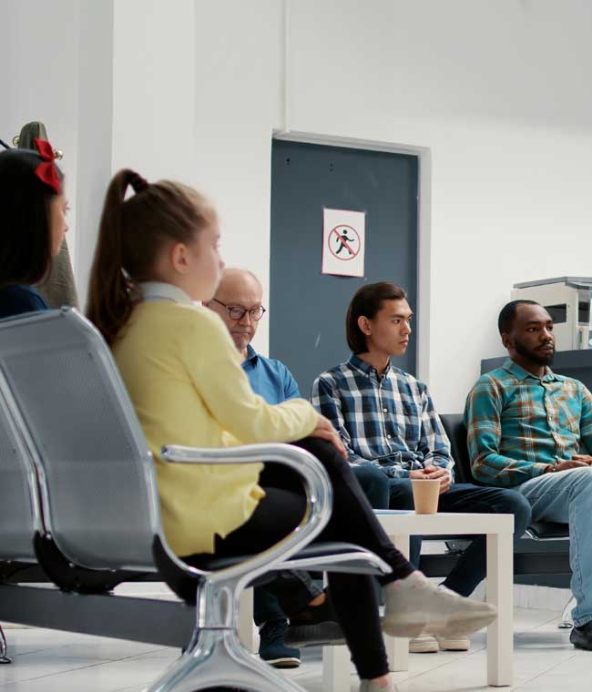 Use it or Lose it1 2 Dental Team Consulting With Patients Seated In The Operatory