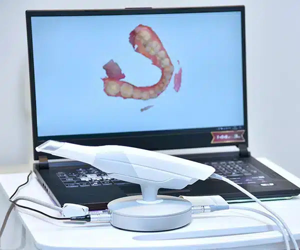 Invisalign Aligners1 19 Dental Professional Reviewing Patient Information On A Computer Monitor